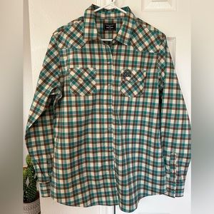 Women’s long sleeve Kimes Ranch pearl snap shirt.